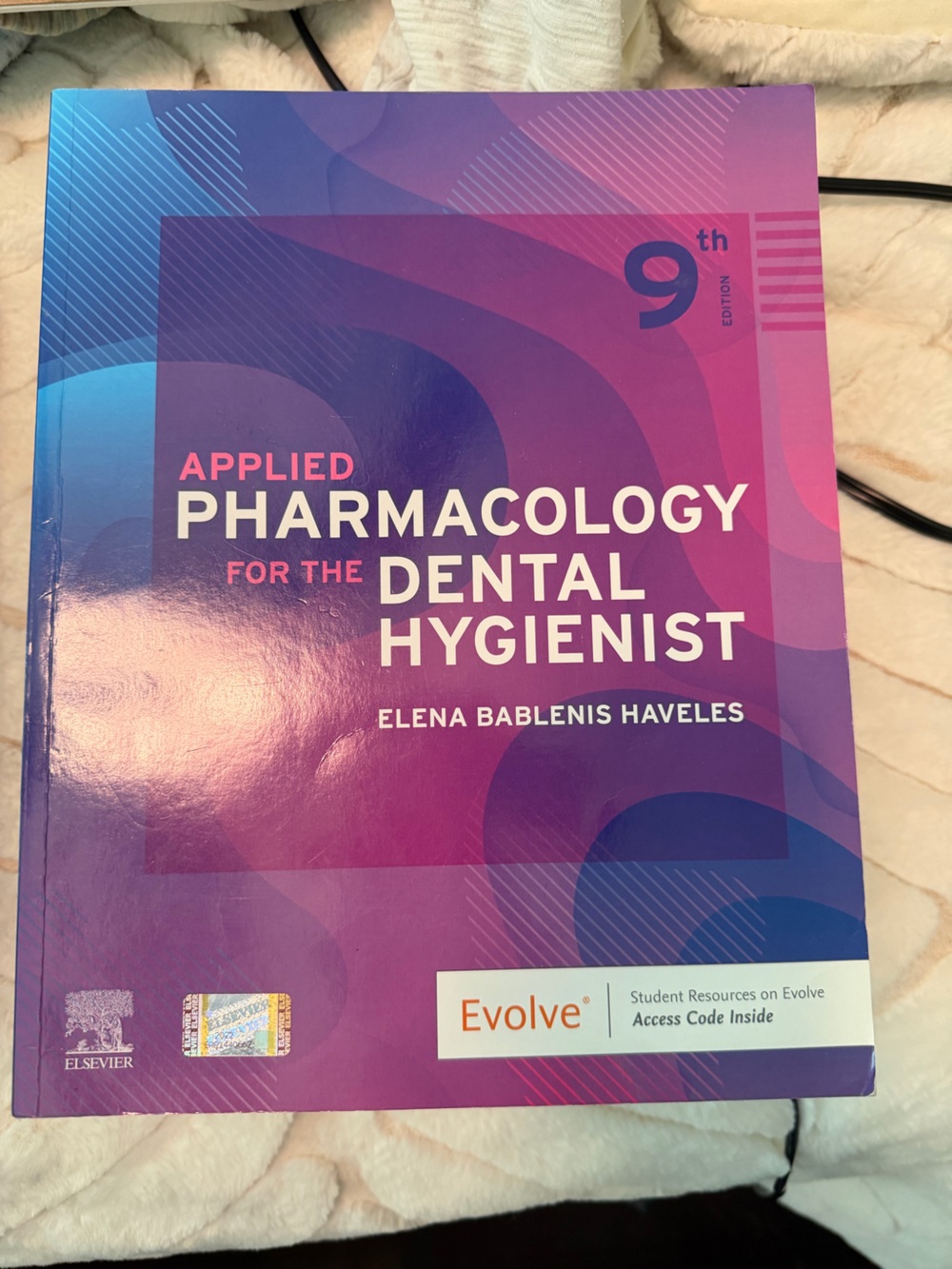 Applied Pharmacology for the Dental Hygienist Textbook - Purple Pink Blue Cover